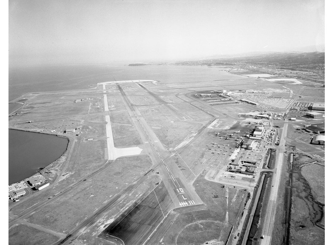 Aerial view of San Francisco International Airport (SFO) facing south toward Runways 10L and 10R  February 26, 1959