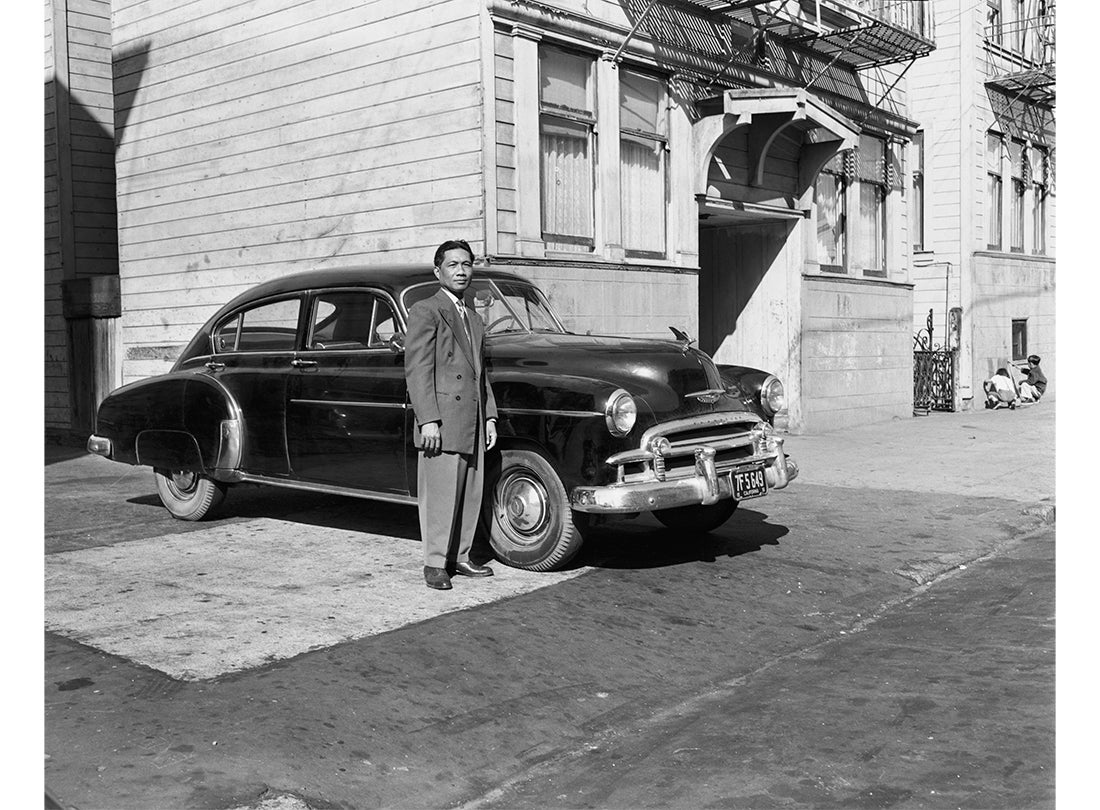 A Manong (First-Generation Filipino American) Stands Beside his 1949 Chevrolet De Luxe  