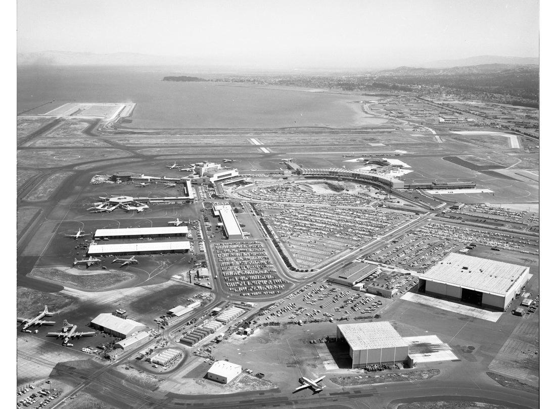 Aerial view of San Francisco International Airport (SFO) f ​​​​​​​acing south toward Coyote Point  August 27, 1963