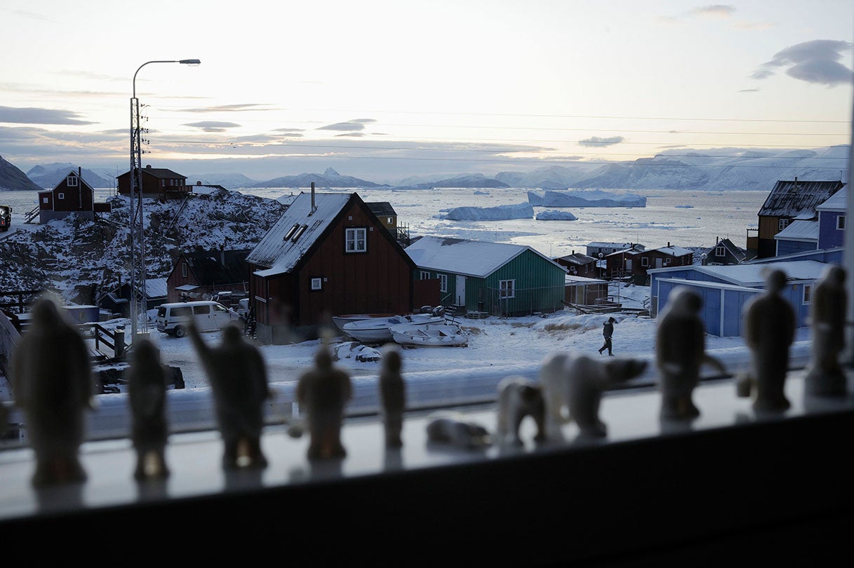 Carvings in a window facing the town of Uummannaq  2009