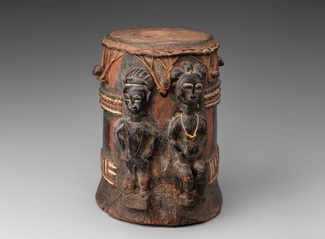 Drum Republic of Côte d’Ivoire Baule peoples wood, hide, pigment, metal, glass Fowler Museum at UCLA; Gift of Helen and Dr. Robert Kuhn X85.461 L2024.0201.016
