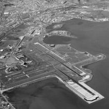 Aerial view of San Francisco International Airport (SFO) facing north toward the city of San Francisco  February 6, 1964