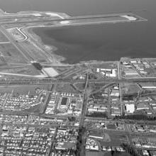 Aerial view of San Francisco International Airport (SFO) facing toward the East Bay  November 16, 1964