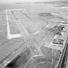 Aerial view of San Francisco International Airport (SFO) facing south toward Runways 10L and 10R  February 26, 1959